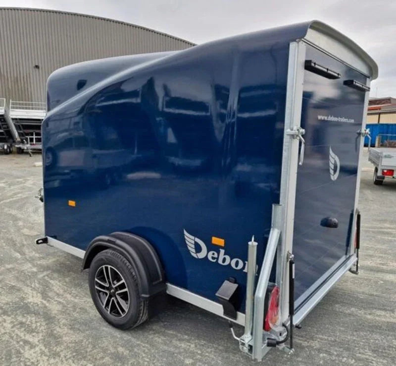 Pullman Debon 1300 blauer Frachtanhänger mit Aufhängung und Seitentür